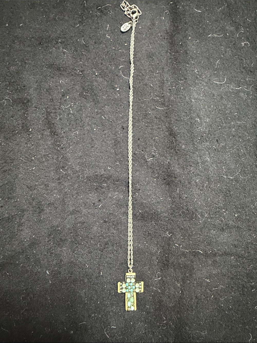 Silver Tone Cross Necklace with Green Gem Accents